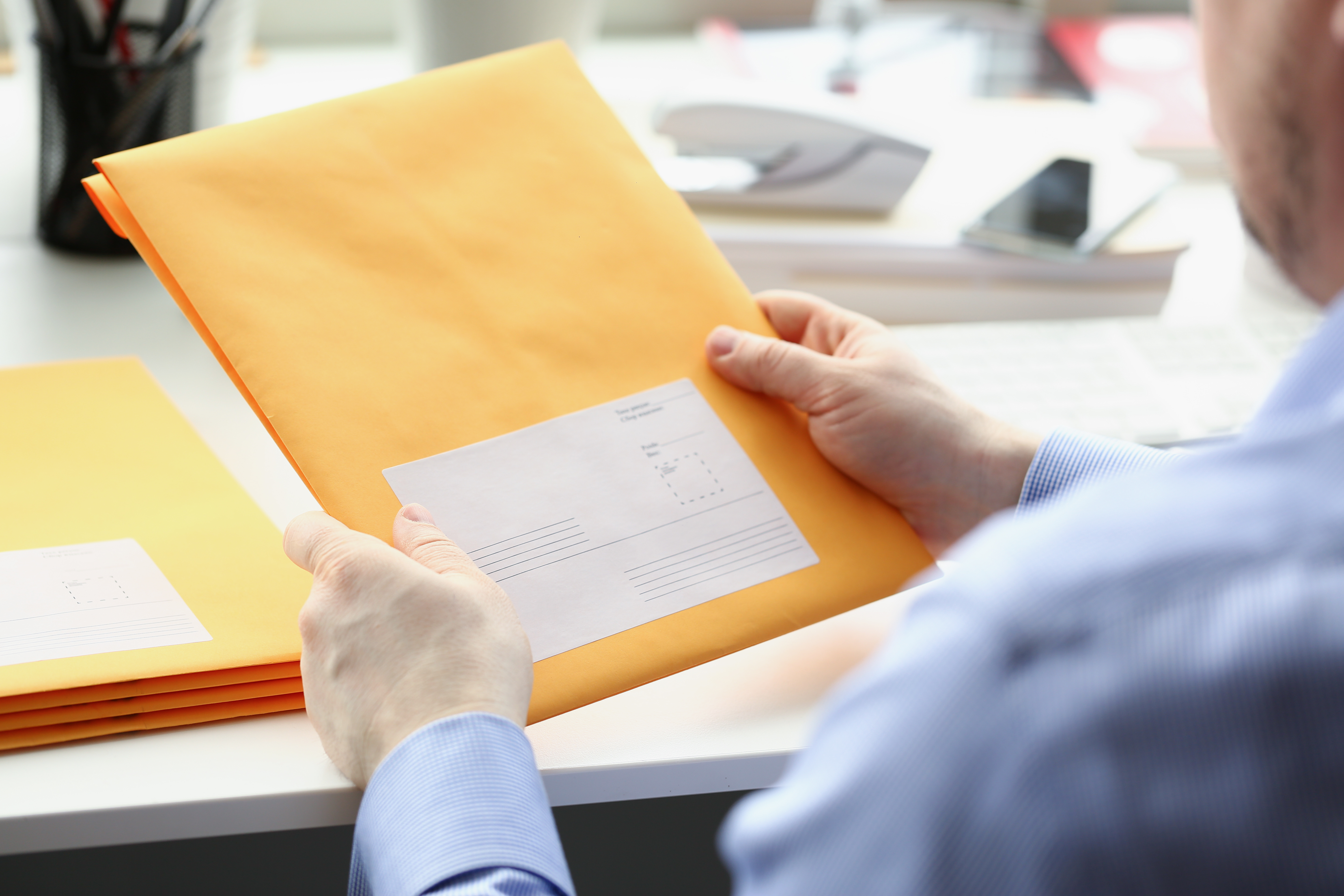 Image of a courier delivering a package